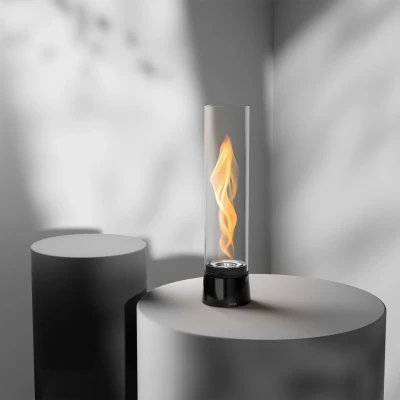 Höfats SPIN Air 1200 - Lareira a bioetanol de mesa preta com vidro cilíndrico alto.